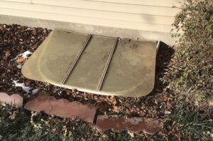 poor quality egress window well cover